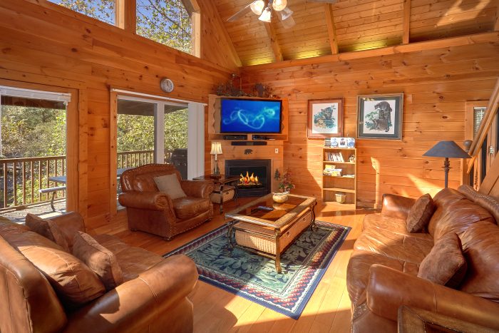Check out this amazing 3 bedroom cabin with hot tub and fireplace and so much more!
